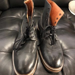 Never been worn, Wolverine black Men’s boots